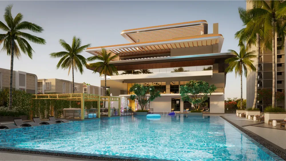 Sattva Songbird clubhouse swimming pool with poolside loungers