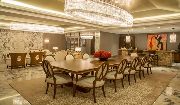 Representative image of a formal dining area in a luxury apartment, similar to Sobha Wisteria homes