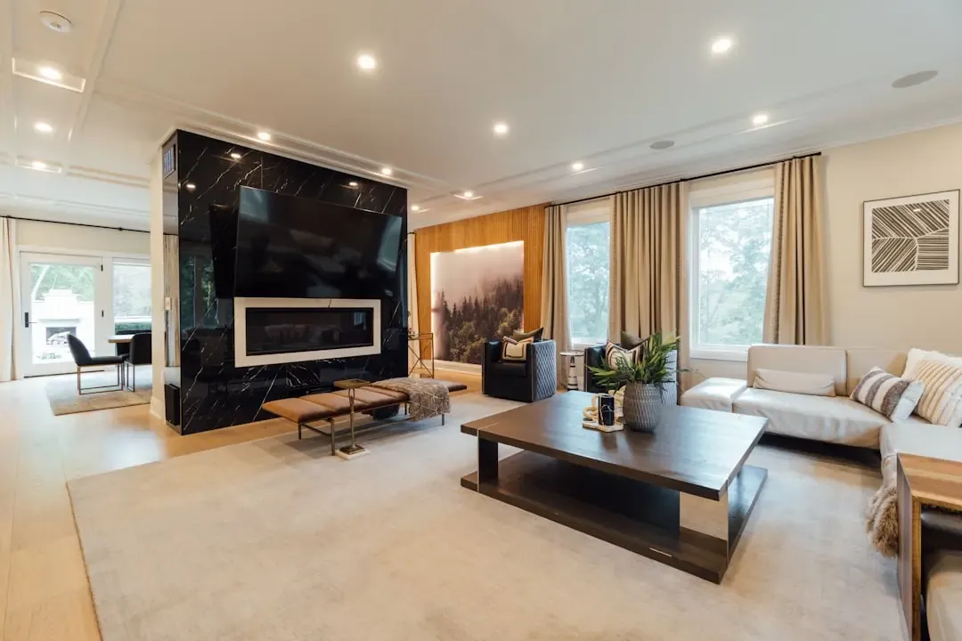 Representative image of a living room with a stone feature wall, similar to premium homes at Sobha Wisteria Egattur
