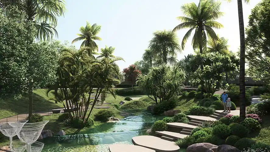 Sattva City water garden with stepping stones and palms