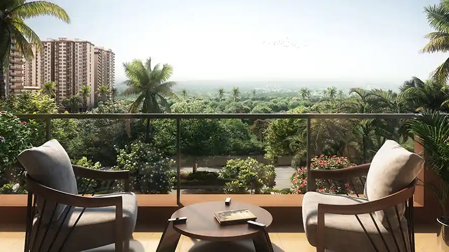 Balcony seating at Sattva City overlooking greenery and neighbouring towers